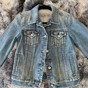 Gap 1969 distressed denim jacket. Women’s size small.